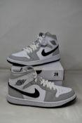 A pair of women's boxed as new Nike Air Jordan 1 Mid - Grey Fog (UK 5, BQ6472-015).