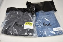 Thirteen pairs of women's Find Brand skinny jeans in light washed (All 28W 32L) and two black