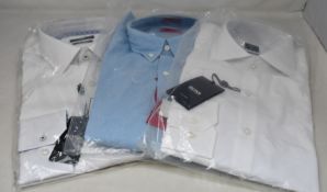 Three as new Hugo Boss clothing items to include 1x Casual Slim Fit Shirt in Blue (Size XL), 1x