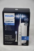 A boxed as new Philips Sonicare ExpertClean 7300 Electric Toothbrush - White.