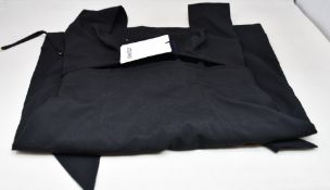 An as new Jacquemus la Robe Limao black halter neck mini dress (Size 36).