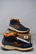 A pair of men's boxed as new Salomon Outpulse Mid GTX - Ebony/Bleached Sand/Vibrant Orange (UK 8).