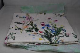 An as new By Hope Home Flora Linen Tablecloth (BHHFLT).