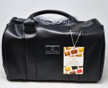 An as new Nova Harley Luxury Manhattan leather changing bag.