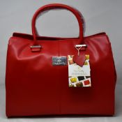 An as new Nova Harley Luxury Amsterdam leather bag.