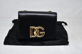 A Dolce & Gabbana small black DG Millennials leather belt bag (Slight pressure mark to front of