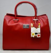 An as new Nova Harley Luxury Amsterdam leather bag.