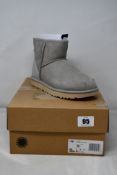 A pair of women's boxed as new UGG Classic Mini II Metallic Boots (UK 3).