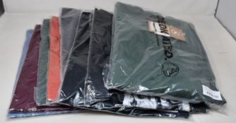 Eight items of as new Dedicated clothing: Six Stocholm Base T-Shirts (Various colours), a Give Me