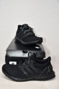 A pair of as new Adidas Ultraboost DNA Pharrell Williams x Parley Black Future (Size UK 5) (Box