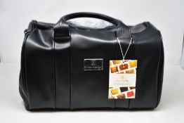 An as new Nova Harley Luxury Manhattan leather changing bag.