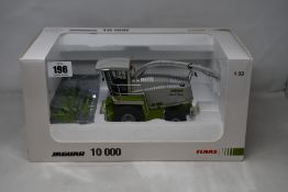 A boxed as new Claas Jaguar 10 000 scale - 1.32 Model.