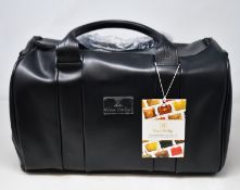An as new Nova Harley Luxury Manhattan leather changing bag.