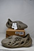 A pair of boxed as new Adidas Yeezy Foam Runner Stone Sage Yeezy , beige (UK 12).