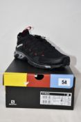 A pair of boxed as new Salomon XT Rush Unisex Sportstyle Shoes in black and cherry tomato (UK 9).