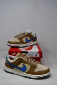 A pair of boxed as new Nike Dunk Low SZ (UK 6).