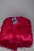 An as new Dolls Kill Delia's Pink Shag Fur Coat (Size L).