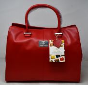An as new Nova Harley Luxury Amsterdam leather bag.