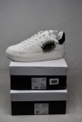 Two pairs of women's boxed as new Kurt Geiger London Laney Eye Sneakers in white (Both EU 41).