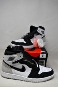 A boxed as new pair of Nike Air Jordan 1 Retro High OG White/Bleached Coral-Black (Size UK 10) (