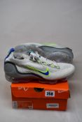 A pair of as new Nike Air Vapormax 2021 FK in White/Hyper Royal-Volt (Size UK 10.5).