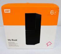 A boxed as new Western Digital My Book 6TB Desktop External Hard Drive (Grade A+. Box sealed, slight