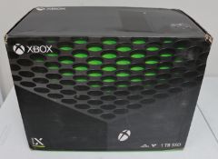 A boxed as new Microsoft Xbox Series X 1TB Console (SKU: RRT-00001 M/N: 1882 EAN: 889842640724) (Box