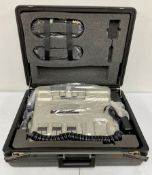 A pre-owned SMC Pneumatics Advanced Spinal Mobilization Instrument (ASMI) Machine in custom foam lin