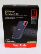 A boxed as new SanDisk Extreme 1TB Portable SSD Hard Drive (EAN: 619659182557) (Box sealed, some dam