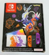 A boxed as new Nintendo Switch OLED Model Pokémon Scarlet & Violet Edition (P/N: LEA-HEG-S-KEAAA-UKV