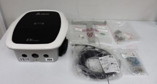 A Delta EV Charger Indoor/Outdoor Charger for Electronic Vehicles (Appears unused, no box. Some as n