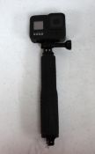 A pre-owned GoPro HERO8 Black 4K Action Camera (Battery included) with a SP Gadgets Pole Camera Moun