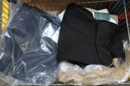 Seven pairs of assorted Ralph Lauren trousers and one pair of Ralph Lauren shorts (Various sizes).
