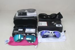 Four pairs of Oakley sunglasses (One pair unboxed), one pair of Nike sunglasses and one pair of Puma