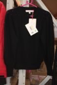 An as new Carolina Herrera black 100% cashmere pullover (Size M).