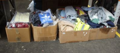 Four boxes of assorted as new clothing and related items.