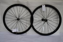 A pair of as new Mid Section 700c carbon fibre road wheels for disc brakes/6 bolt hubs, Shimano free