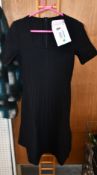 An as new Carolina Herrera lace stitch black flare dress (Size M).