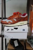 A pair of boxed as new Nike Air Max 1 Patta 'Waves' in Dark Russet (UK 9).