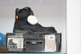 A pair of men's boxed as new Icon Stormhawk Boots - Black (UK 10).