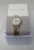 A women's boxed as new Camille Quartz Crystal White Dial Watch.