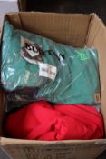 A box of as new clothing including T-shirts, jeans, cardigans and jackets.