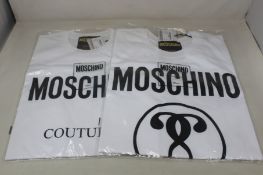 Two as new white Moschino T-Shirts with front logos (Size 2 x 54).