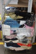 A basket of miscellaneous; mainly as new designer clothing to include brands - Guess, Levi's, APL