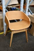 A pre-owned Mason Solid Wood Dining Chair.