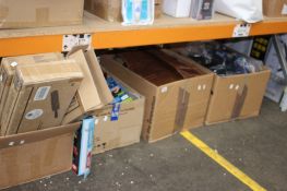 Four boxes of miscellaneous items to include games, household items and body supports.