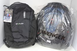 An as new Wenger black/blue/grey back pack and a Thule SPXFlow black back pack.