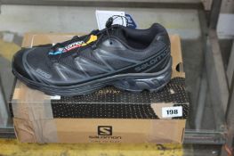 A pair of boxed as new Salomon XT 6 Unisex Sportstyle Shoes - Black (UK 11).