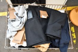 A basket containing assorted Burberry and Emporio Armani clothing and related (Basket not