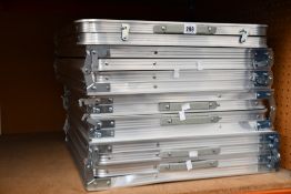 Four pre-owned foldable tables.